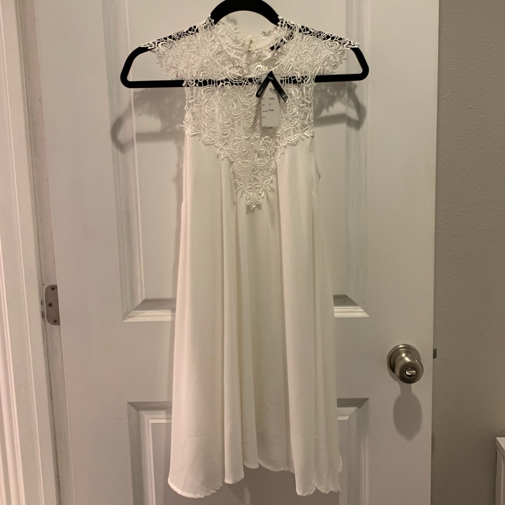 White embroidered neck dress